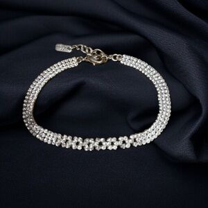 Christina Collection silver tone triple row rhinestone tennis anklet